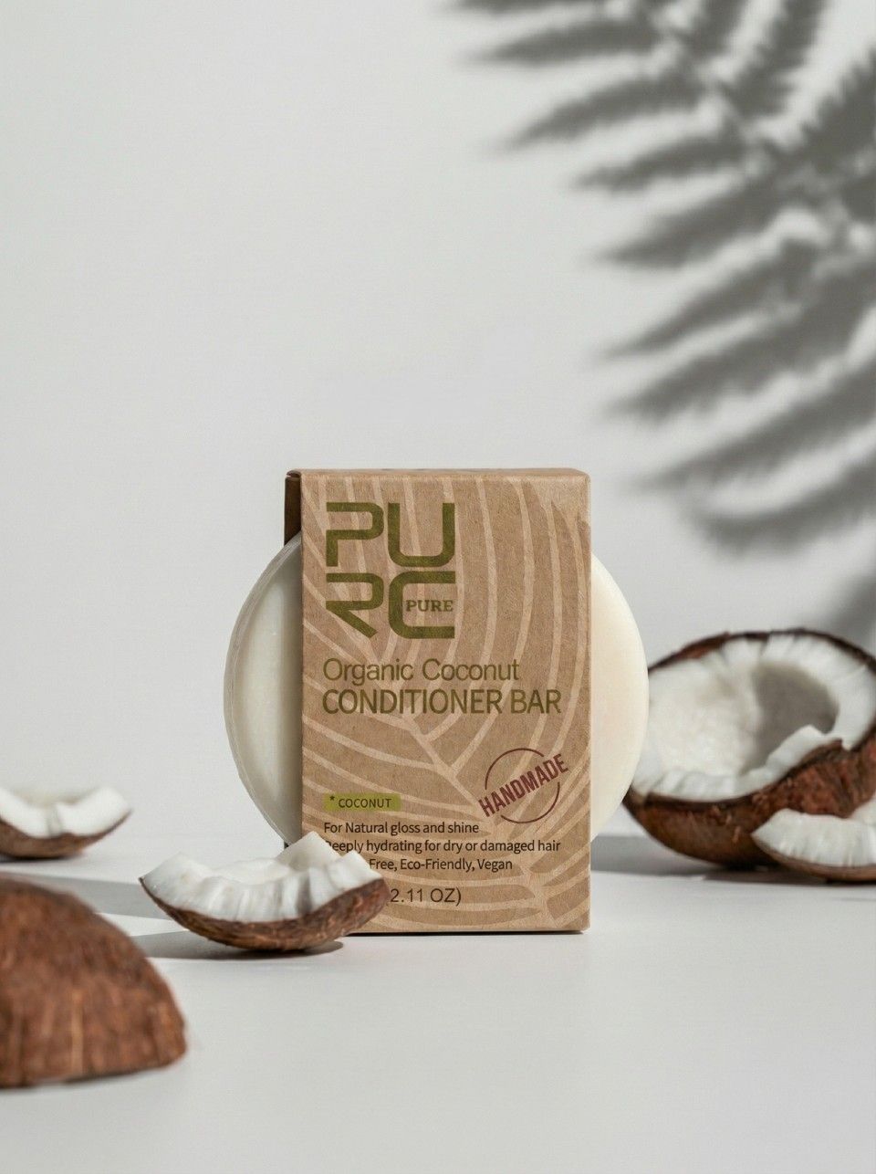 A round, light-colored conditioner bar rests on a white surface, adorned with small green leaves and delicate lavender sprigs. The bar has subtle indentations on its top surface.