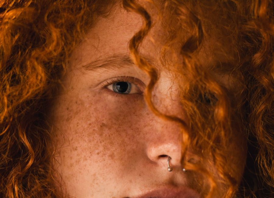 close up photo of person with nose ring